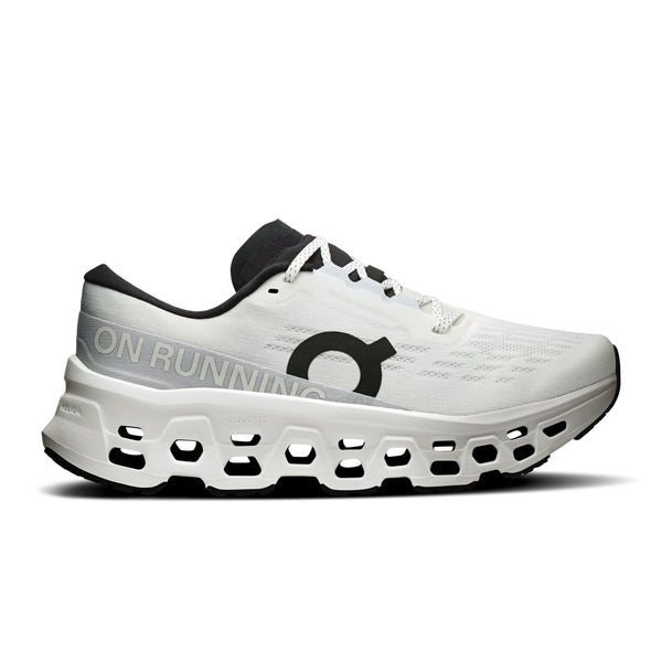 On Womens Cloudmonster 3 running shoe side view showing max cushioning | White White